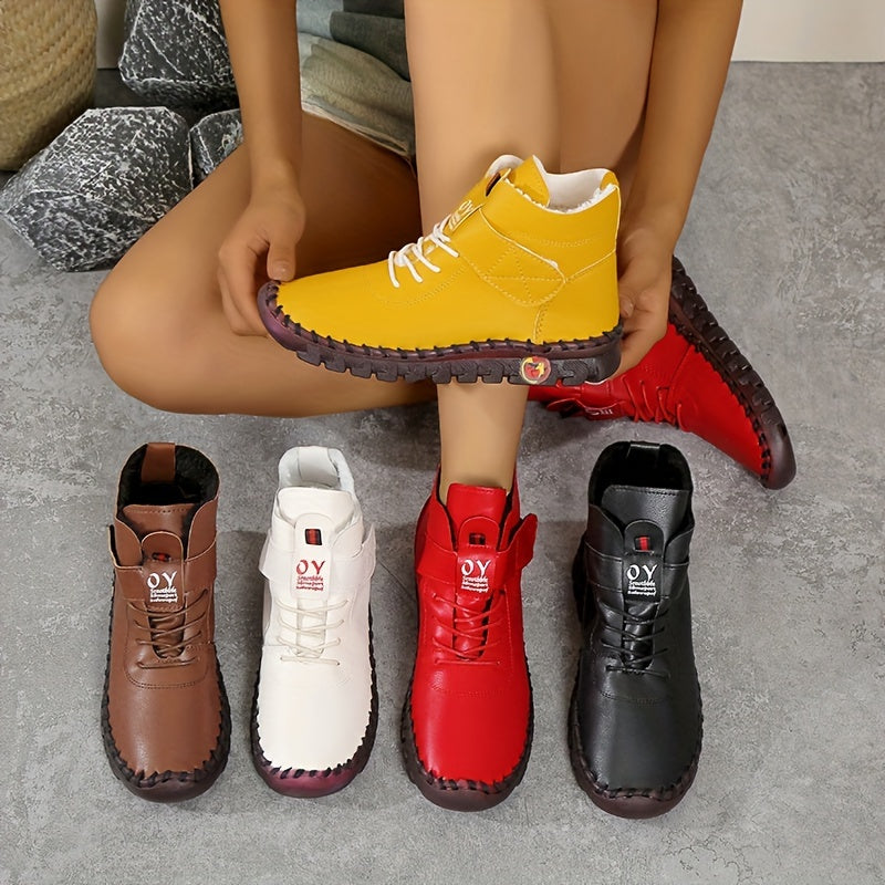 Close-up of suede knee-high women’s boots