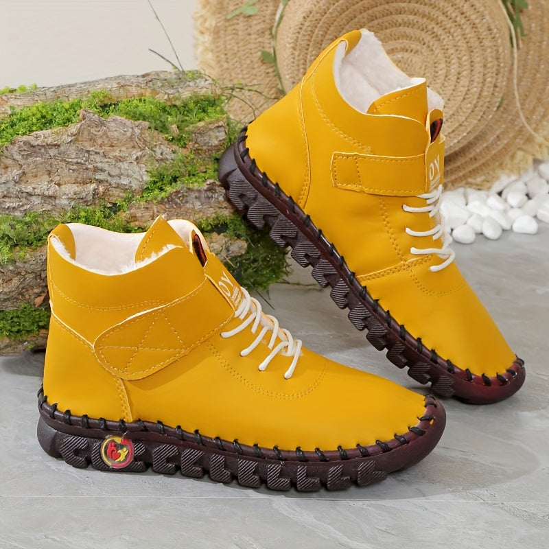 Model wearing tan chunky heel boots with jeans