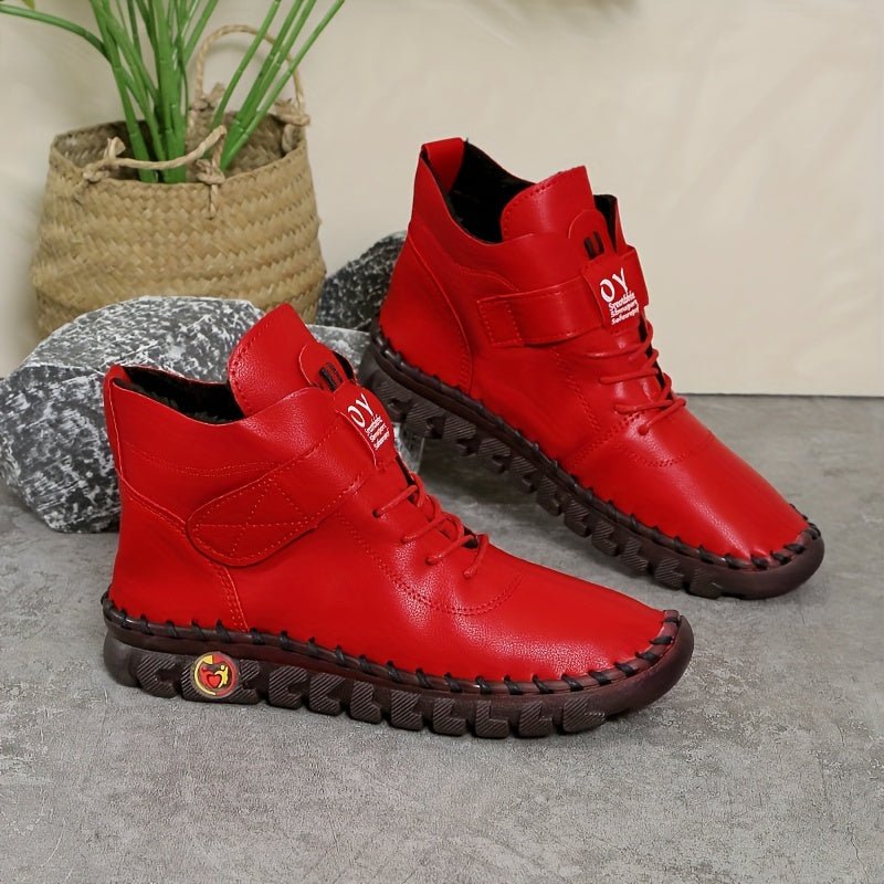 Pair of beige suede boots with pointed toes